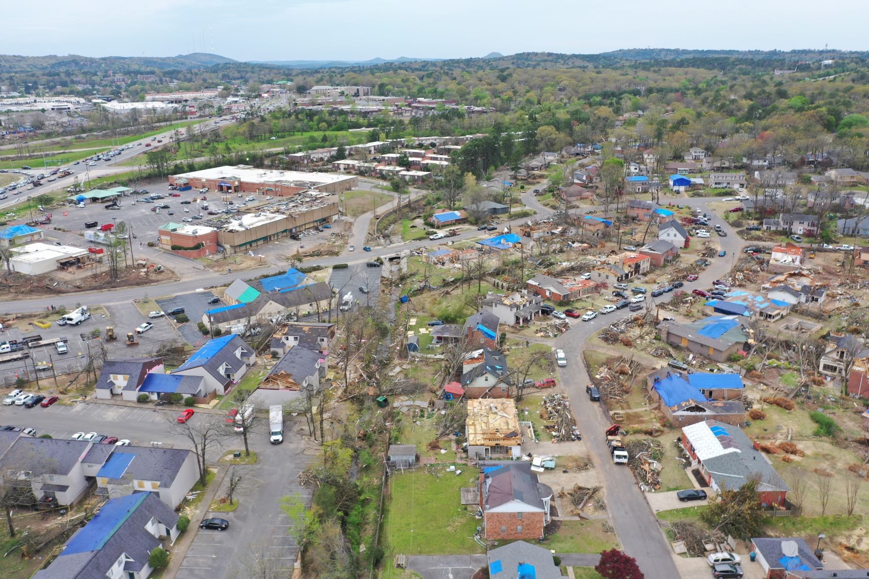 Blue tarps can be seen above Little Rock, evidence of the tornado damage that occurred. 